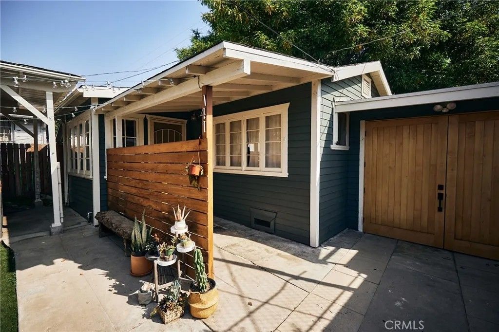 Photo of 141 Roselawn Place, Los Angeles, CA 90042 (MLS # CV26012146)