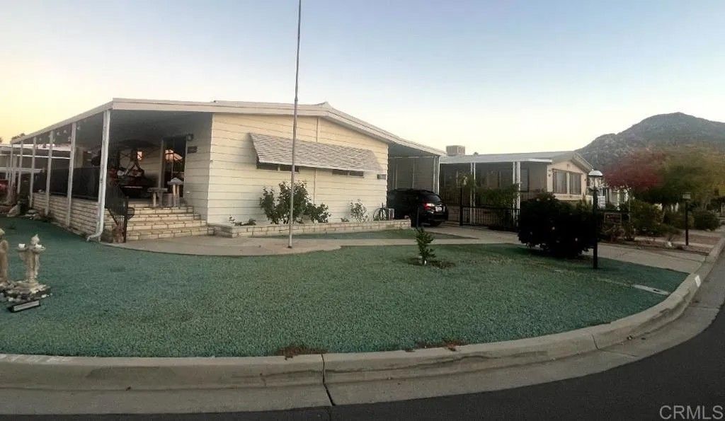 Photo of 26056 Butterfly Palm Dr, Homeland, CA 92548 (MLS # NDP2601512)