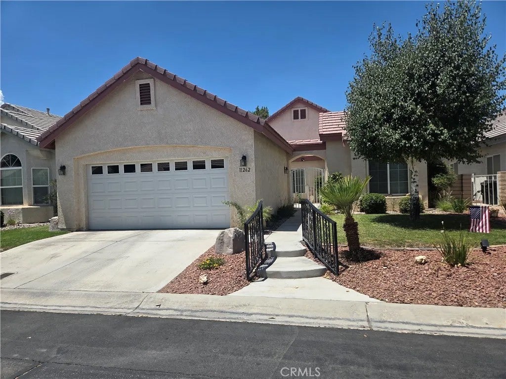 Photo of 11262 Country Club, Apple Valley, CA 92308 (MLS # HD26197622)
