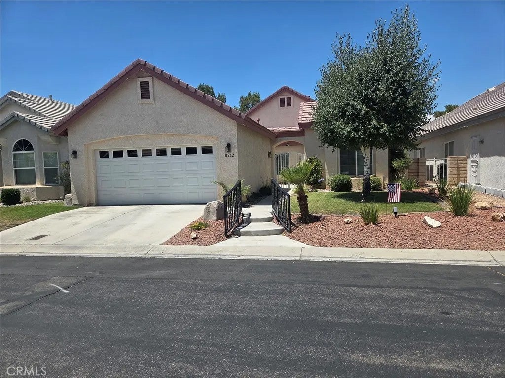 Photo of 11262 Country Club, Apple Valley, CA 92308 (MLS # HD26197622)