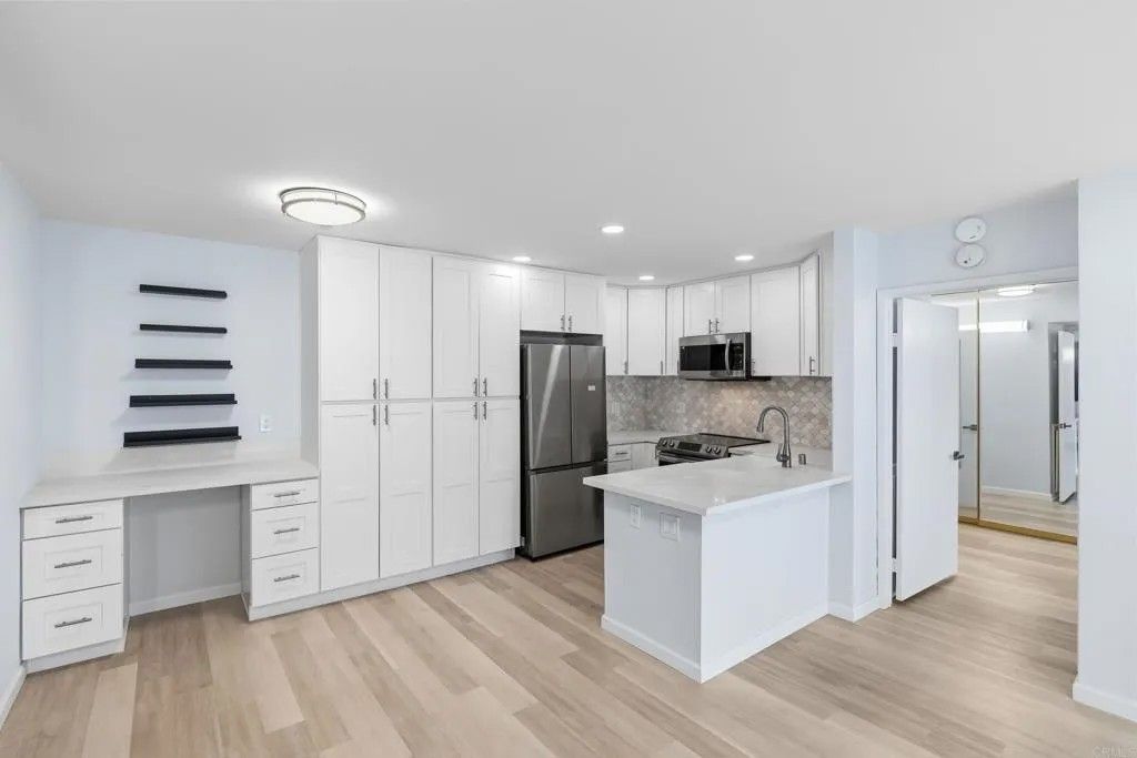 Photo of 12555 Oaks North Drive #203, San Diego, CA 92128 (MLS # NDP2601310)