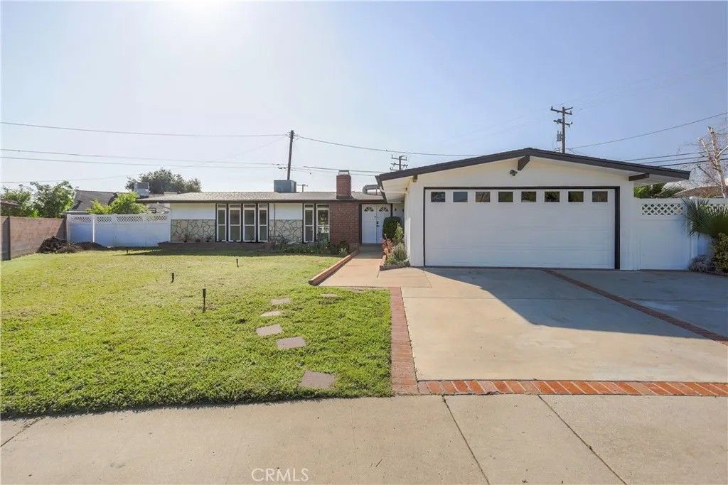 Photo of 1049 N Macneil St, San Fernando, CA 91340 (MLS # SR26049168)