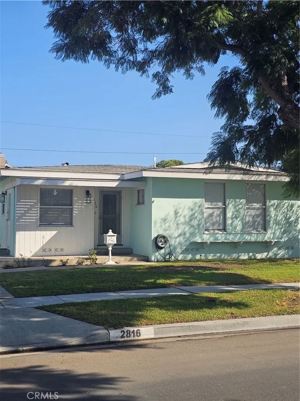 Photo of 2816 N Greenbrier Road, Long Beach, CA 90815 (MLS # PW25245195)