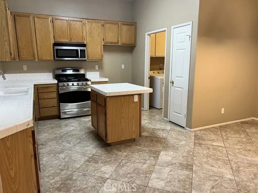 Photo of 39734 Barbados Dr, Murrieta, CA 92563 (MLS # SW25280655)