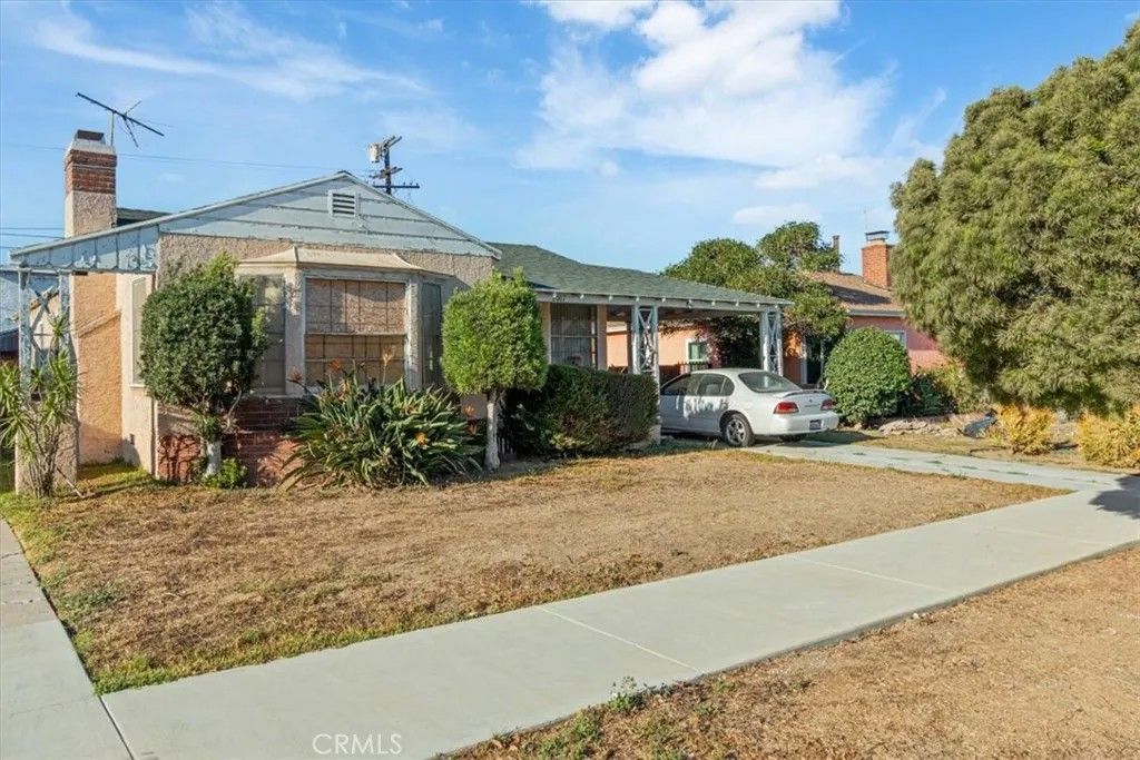 Photo of 2007 W 94th Street, Los Angeles, CA 90047 (MLS # SR26003332)