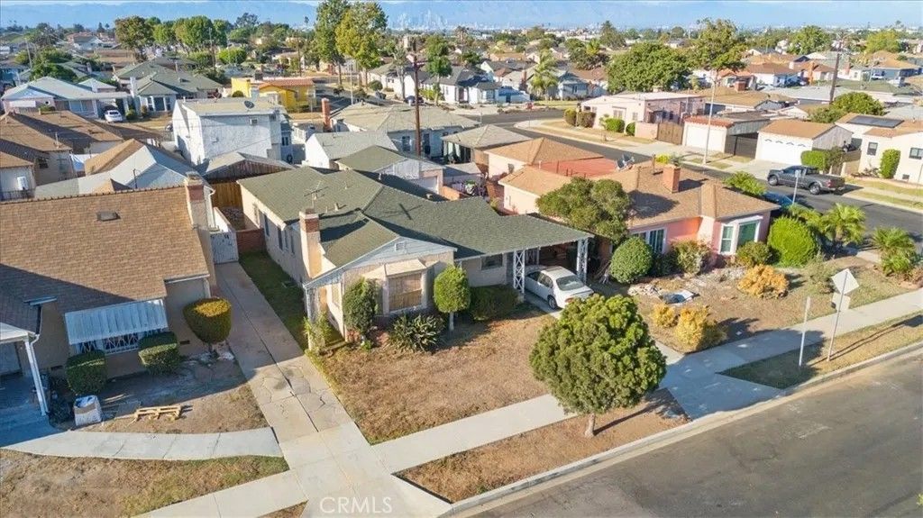 Photo of 2007 W 94th Street, Los Angeles, CA 90047 (MLS # SR26003332)