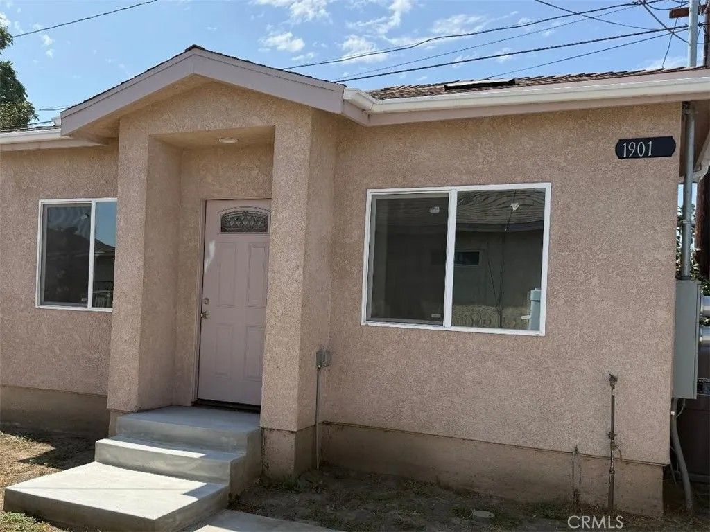 Photo of 1901 N Grape, Compton, CA 90222 (MLS # RS26032136)