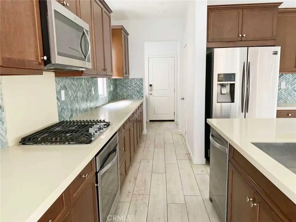 Photo of 15769 Begonia Ave, Chino, CA 91708 (MLS # OC26045539)