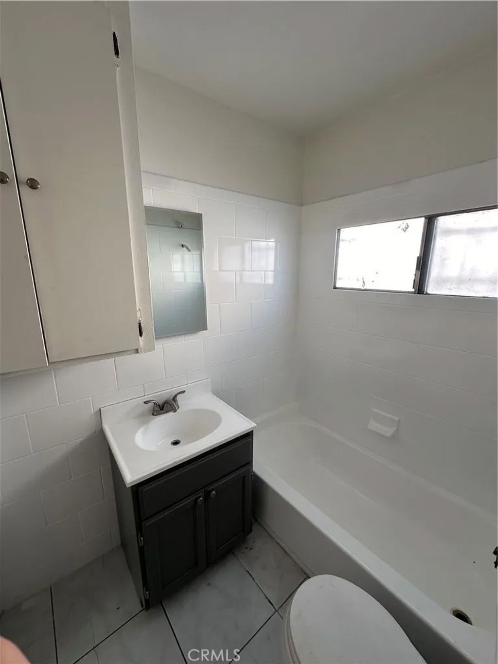 Photo of 209 W 89th ST, Los Angeles, CA 90003 (MLS # DW26096436)