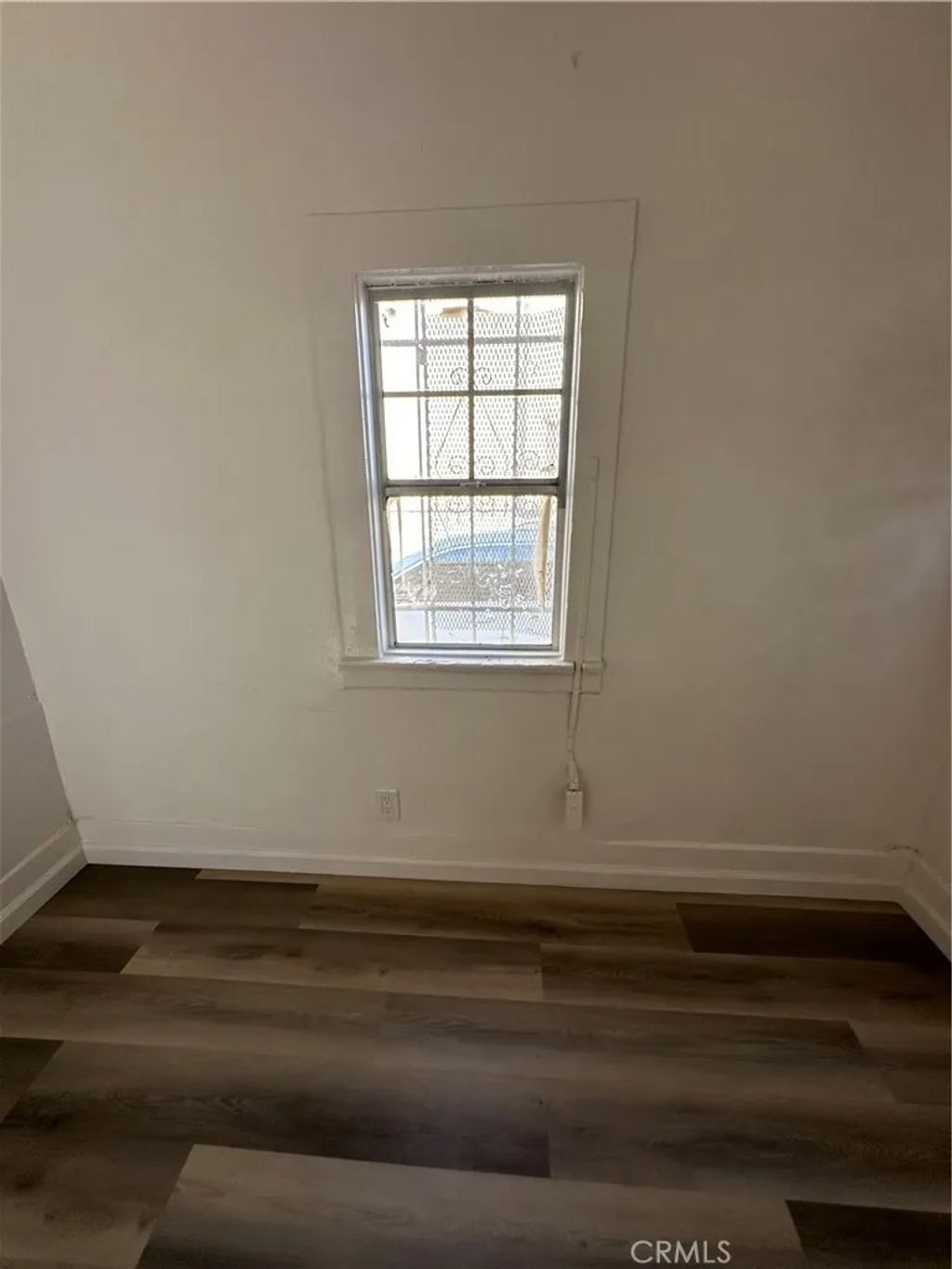 Photo of 209 W 89th ST, Los Angeles, CA 90003 (MLS # DW26096436)