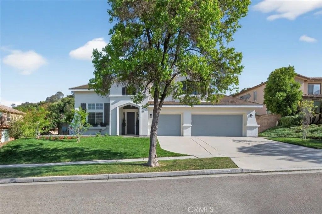 Photo of 1702 Tamarron Dr, Corona, CA 92883 (MLS # SW26068044)