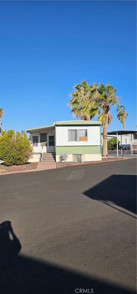 Photo of 701 Montara Rd #51, Barstow, CA 92311 (MLS # HD26152552)