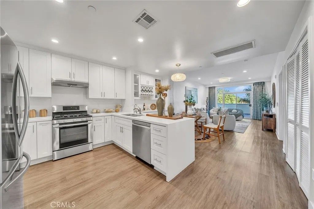 Photo of 56 E Duarte Rd #318, Arcadia, CA 91006 (MLS # AR26010876)