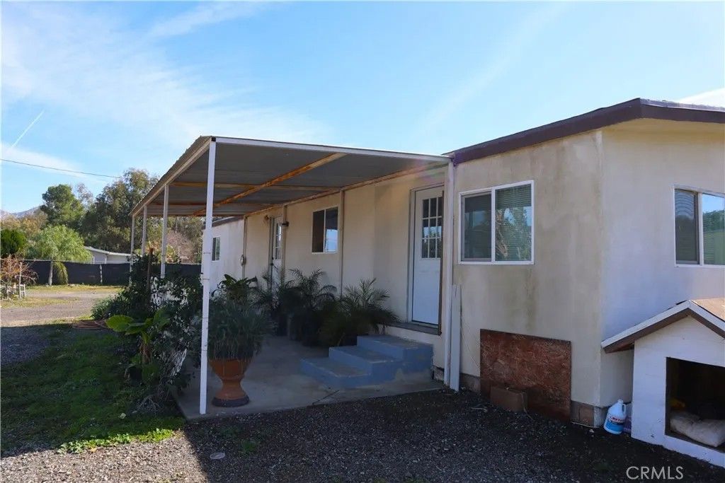 Photo of 31721 Meadow Blossom Dr, Nuevo, CA 92567 (MLS # IV26034268)