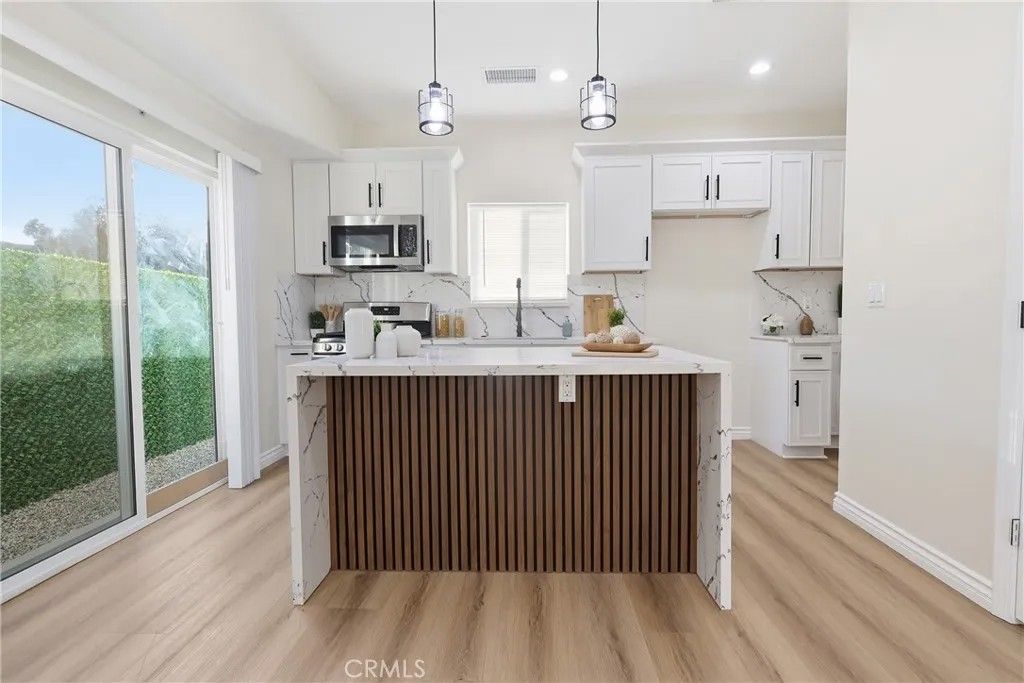 Photo of 3884 N Mountain View, San Bernardino, CA 92405 (MLS # IG26025080)