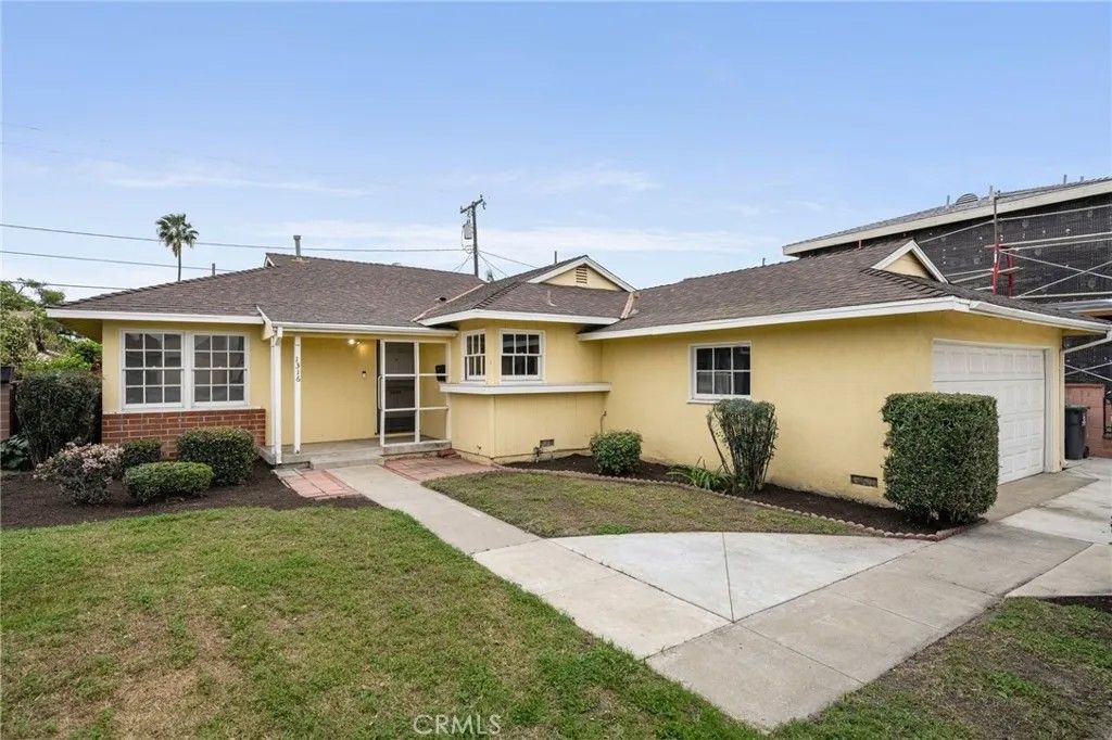 Photo of 1316 N East Street, Anaheim, CA 92805 (MLS # PW26002951)