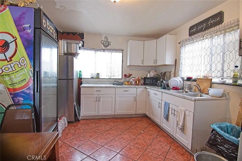 Photo of 6911 Compton Ave, Los Angeles, CA 90001 (MLS # IG25280028)