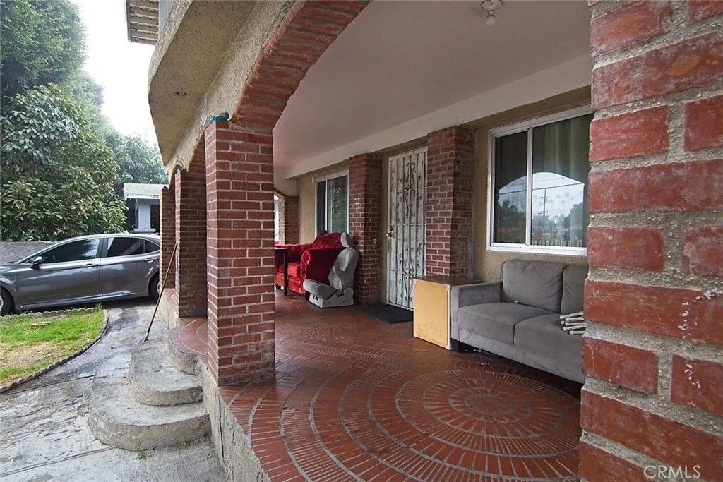 Photo of 6911 Compton Ave, Los Angeles, CA 90001 (MLS # IG25280028)