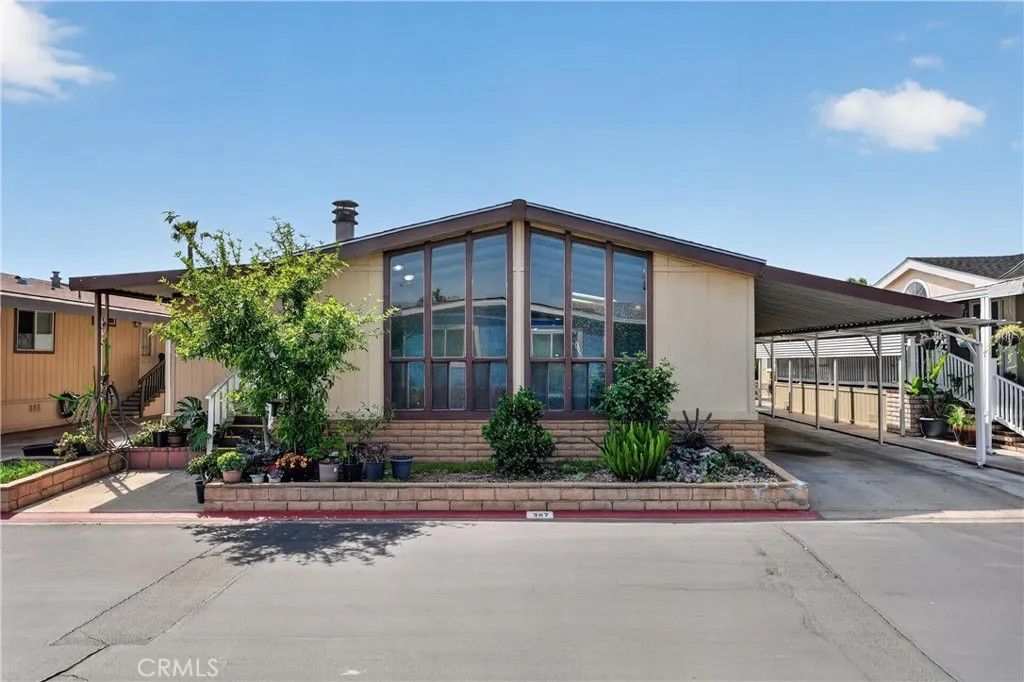 Photo of 1456 E Philadelphia St #387, Ontario, CA 91761 (MLS # TR26078517)