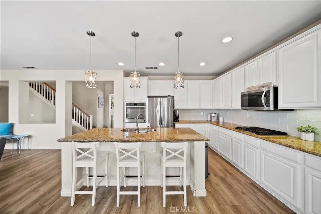 Photo of 13413 Pelican Peak Court, Eastvale, CA 92880 (MLS # CV26030044)