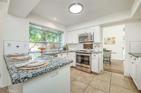 Tiny photo for 298 E Lindbrook Lane, Fresno, CA 93720 (MLS # FR25235108)