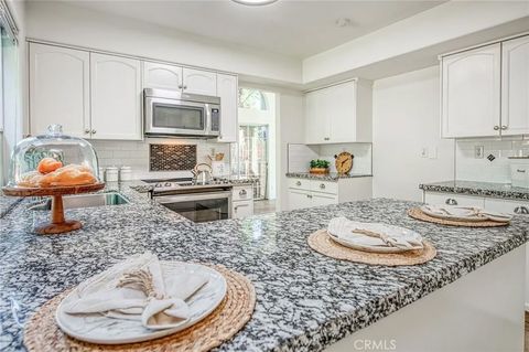 Tiny photo for 298 E Lindbrook Lane, Fresno, CA 93720 (MLS # FR25235108)