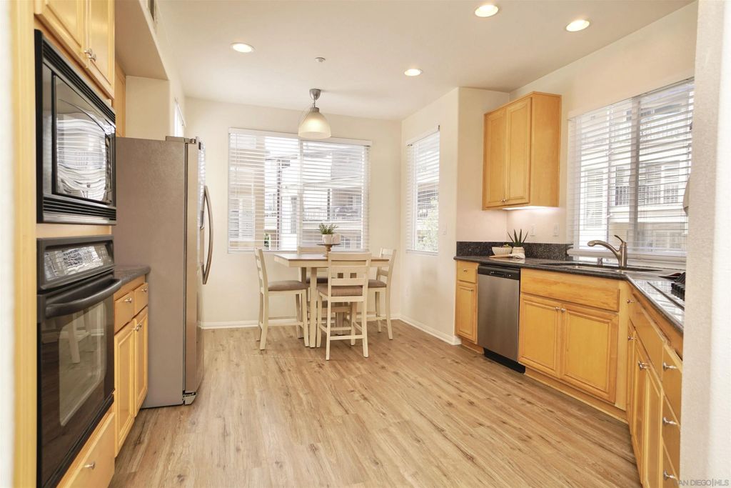 Photo of 817 Kalpati Circle #212, Carlsbad, CA 92008 (MLS # 250044609)