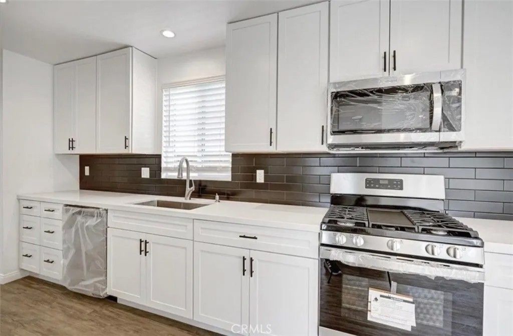 Photo of 6219 Glide Avenue, Woodland Hills, CA 91367 (MLS # SR26020812)