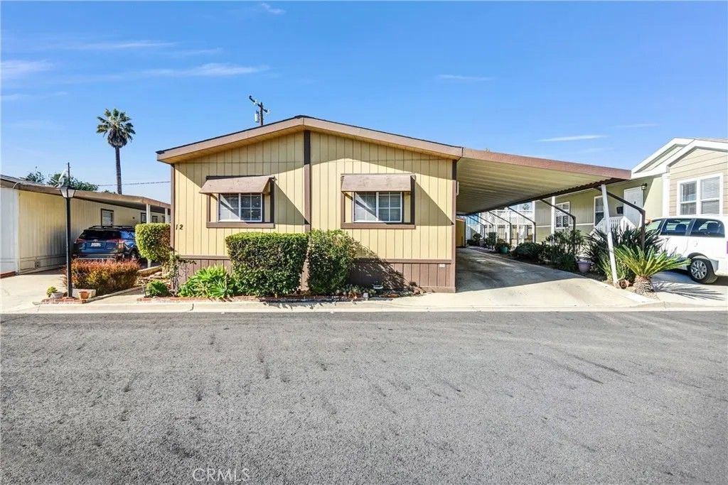 Photo of 2755 Arrow Hwy #12, La Verne, CA 91750 (MLS # CV26006046)