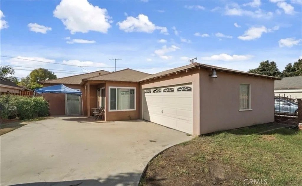 Photo of 1701 N Paulsen Ave, Compton, CA 90222 (MLS # DW26190157)