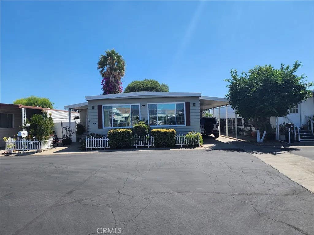 Photo of 8811 Canoga AVE #109, Canoga Park, CA 91304 (MLS # SR26178479)