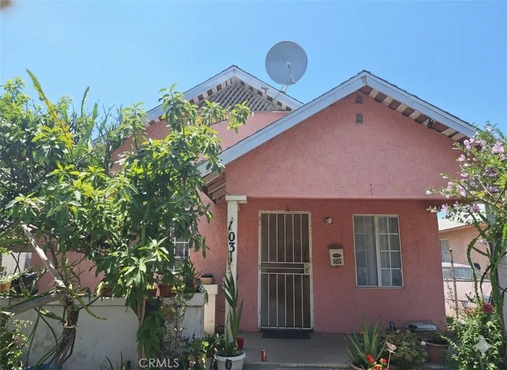 Photo of 1031 S Ditman Ave, Los Angeles, CA 90023 (MLS # CV26018950)