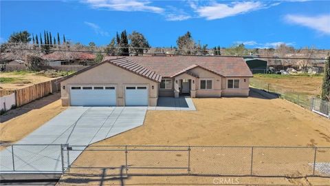 Photo of 9148 Piedra Avenue, Hesperia, CA 92345 (MLS # HD26049034)