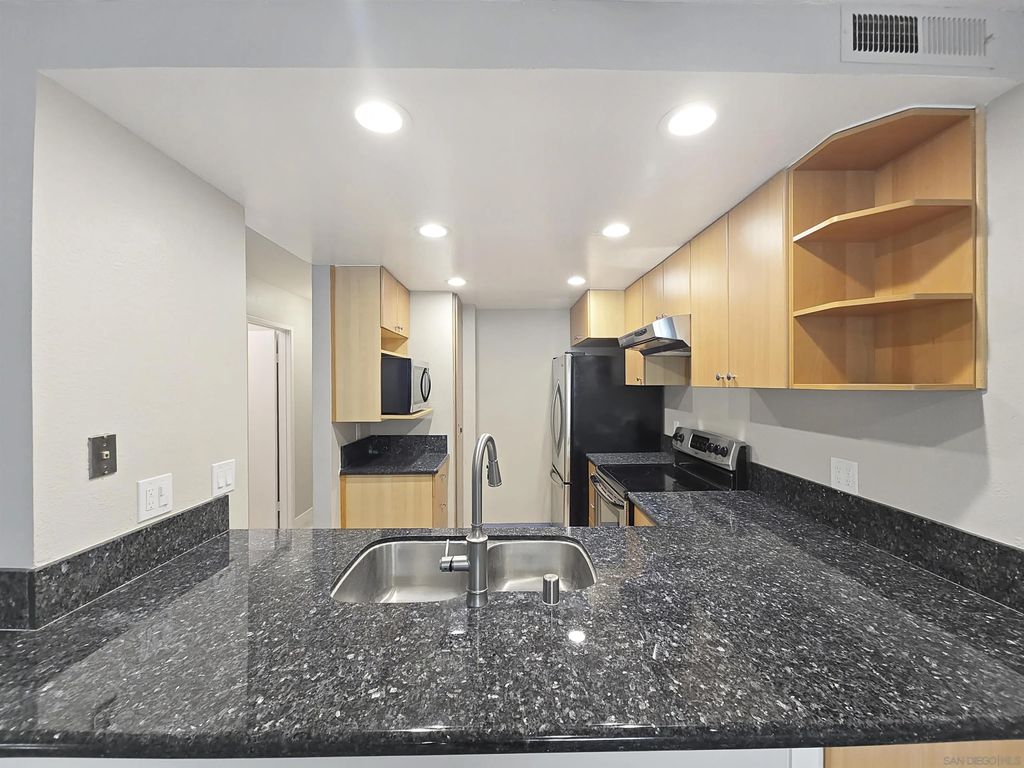 Photo of 5440 Baltimore Dr #92, La Mesa, CA 91942 (MLS # 260008023)