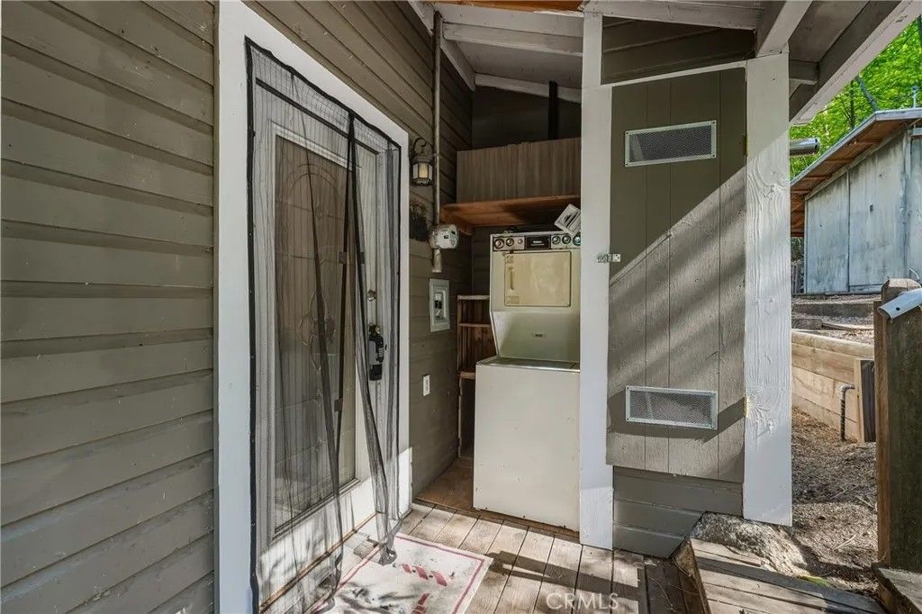 Photo of 16179 Madrone Blvd, Cobb, CA 95426 (MLS # LC26065297)