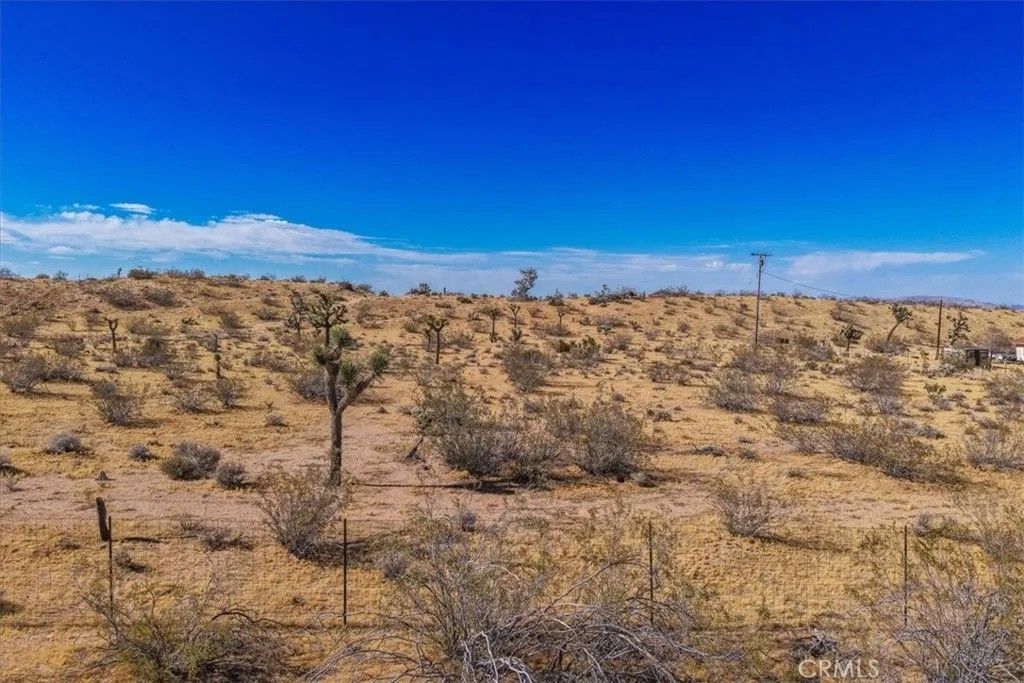 Photo of 56666 Lowe AVE, Yucca Valley, CA 92284 (MLS # JT26104495)