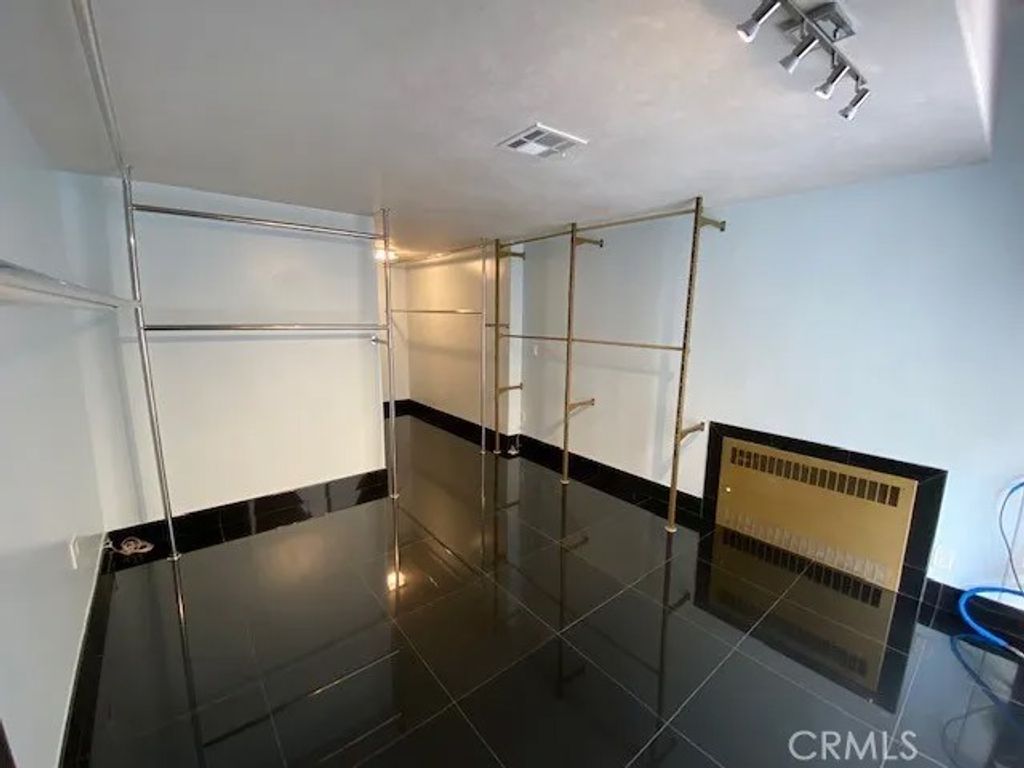 Photo of 1333 S Beverly Glen #105, Los Angeles, CA 90024 (MLS # SR26021786)