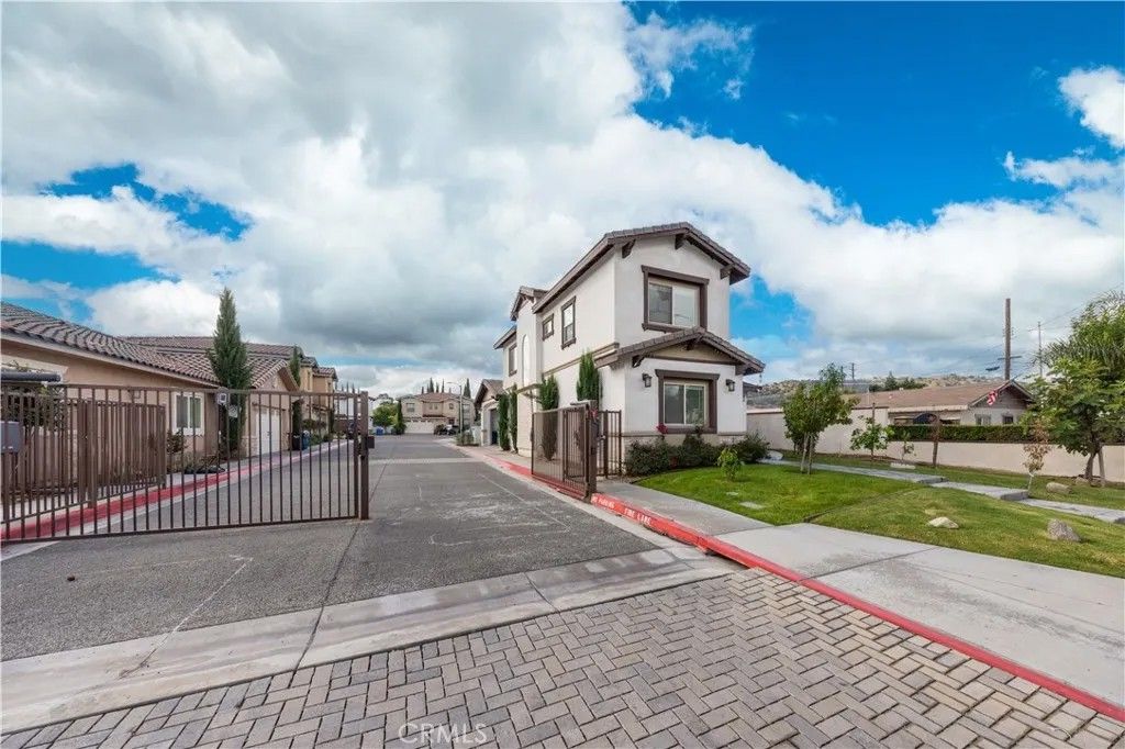 Photo of 1456 W 11th St, Pomona, CA 91766 (MLS # TR26002875)