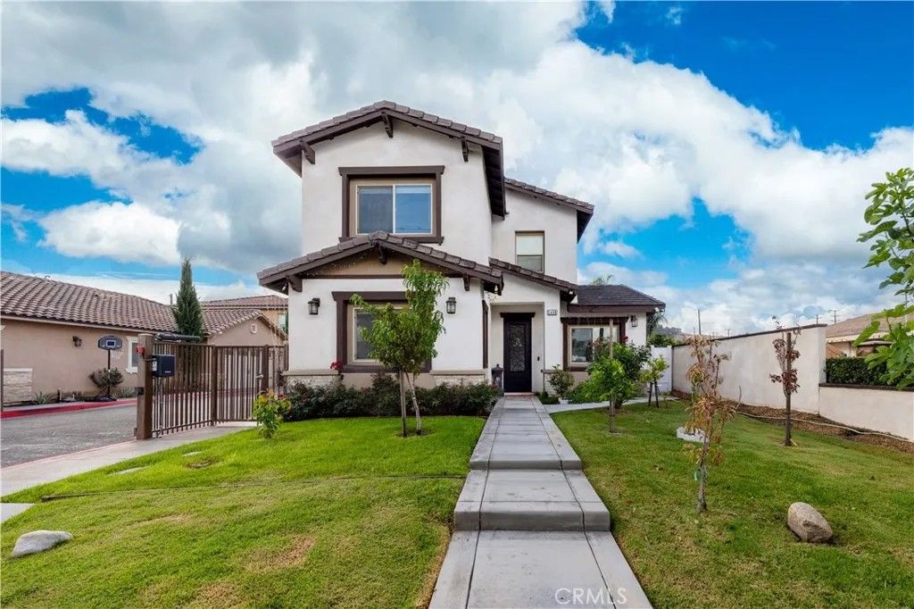 Photo of 1456 W 11th St, Pomona, CA 91766 (MLS # TR26002875)