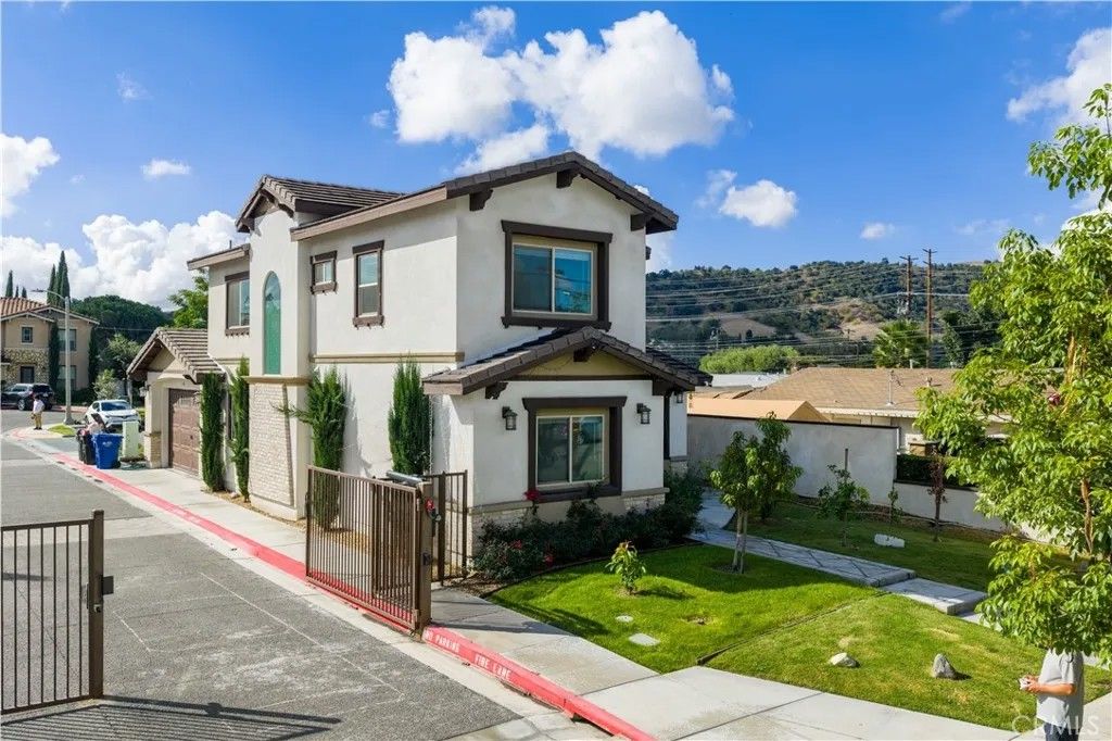 Photo of 1456 W 11th St, Pomona, CA 91766 (MLS # TR26002875)