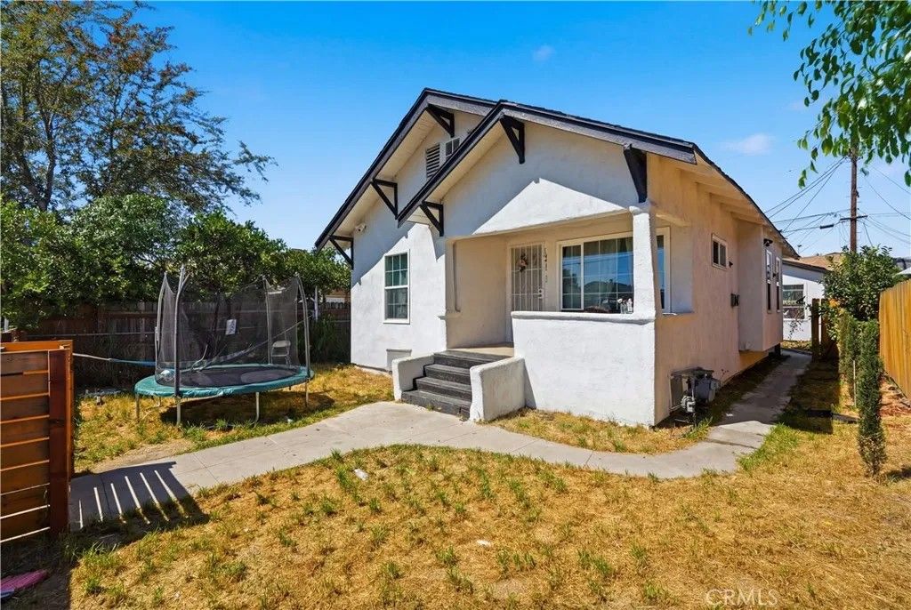 Photo of 1471 E 41st, Los Angeles, CA 90011 (MLS # DW26070623)