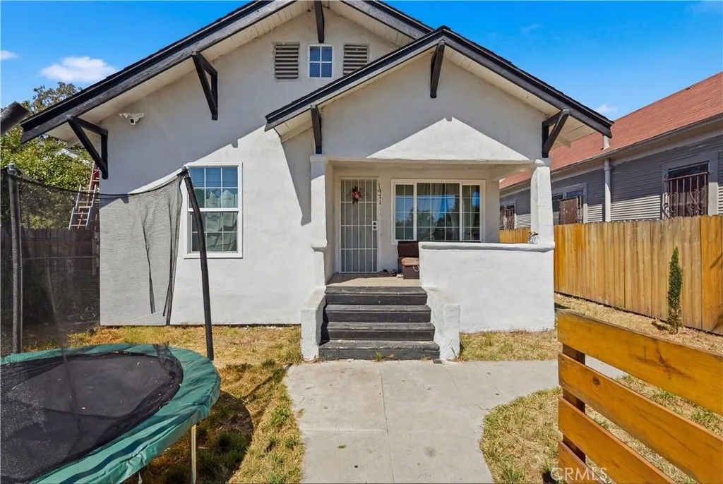 Photo of 1471 E 41st, Los Angeles, CA 90011 (MLS # DW26070623)