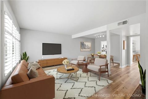 Photo of 10240 Zelzah Avenue #3, Northridge, CA 91325 (MLS # SR26032565)