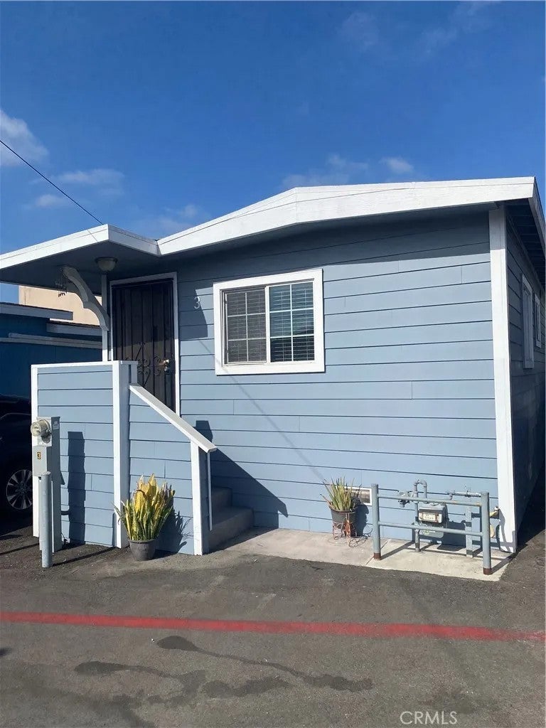 Photo of 1215 W 134th ST, Gardena, CA 90247 (MLS # DW26213867)