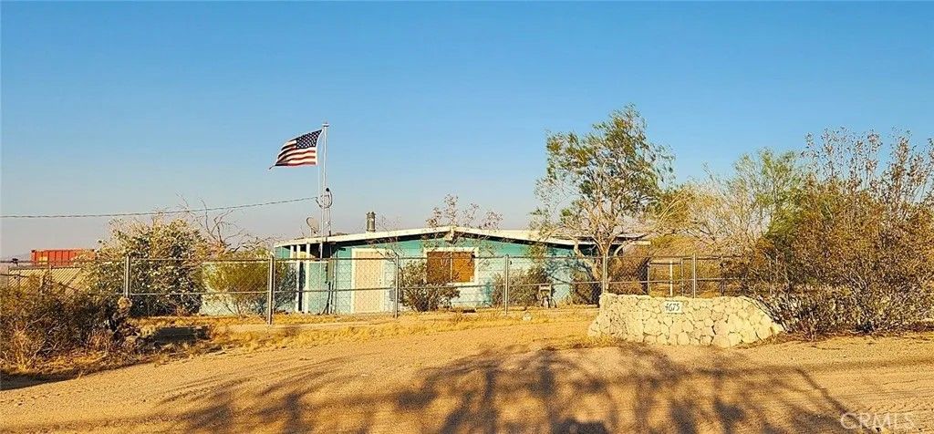 Photo of 4675 Kickapoo Trail, Landers, CA 92285 (MLS # JT25280681)