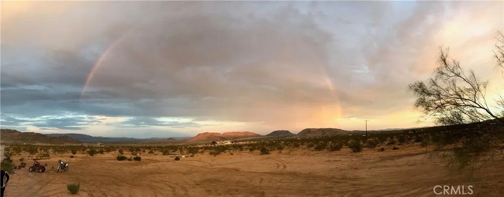 Photo of 4675 Kickapoo Trail, Landers, CA 92285 (MLS # JT25280681)