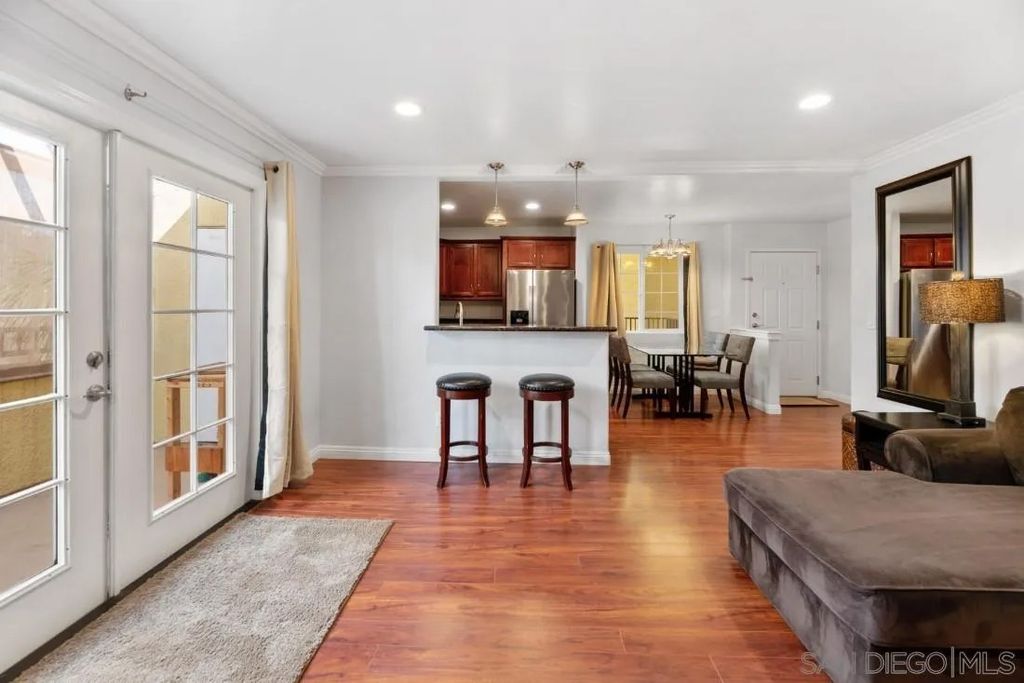 Photo of 5055 Collwood Blvd #303, San Diego, CA 92115 (MLS # 2600170)