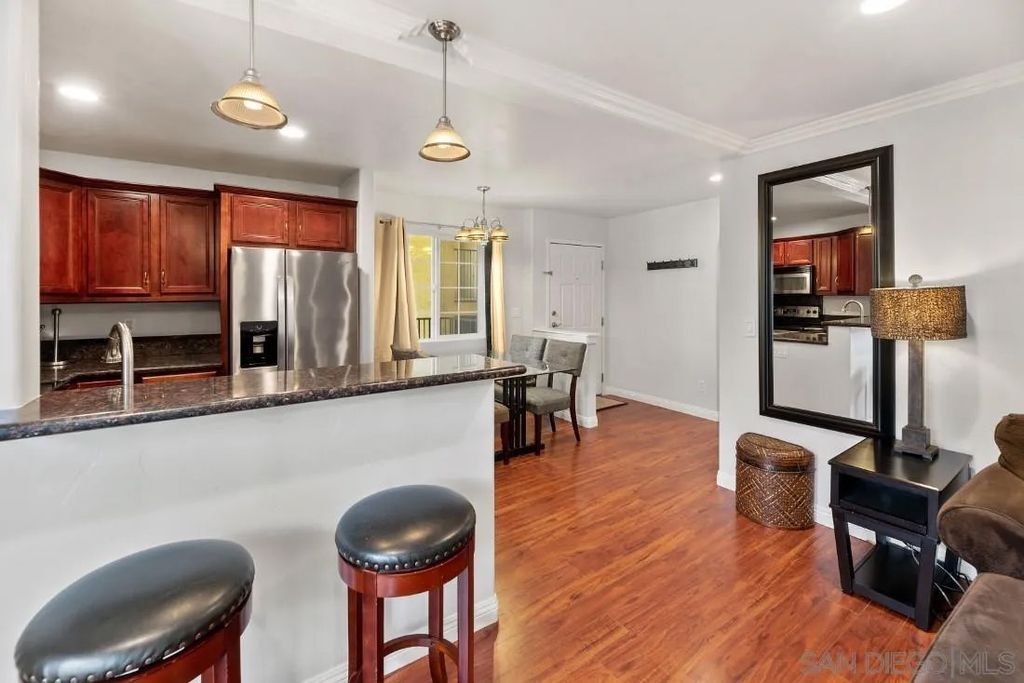 Photo of 5055 Collwood Blvd #303, San Diego, CA 92115 (MLS # 2600170)