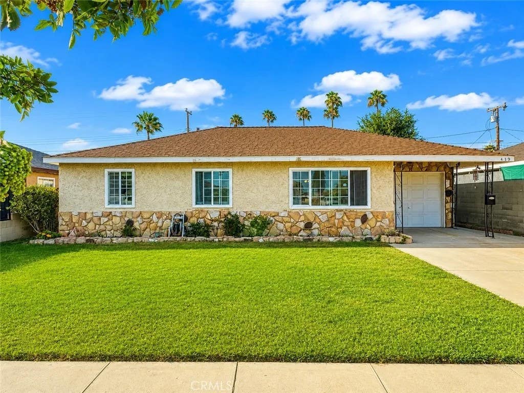 Photo of 419 E 186th Street, Carson, CA 90746 (MLS # MB26164949)
