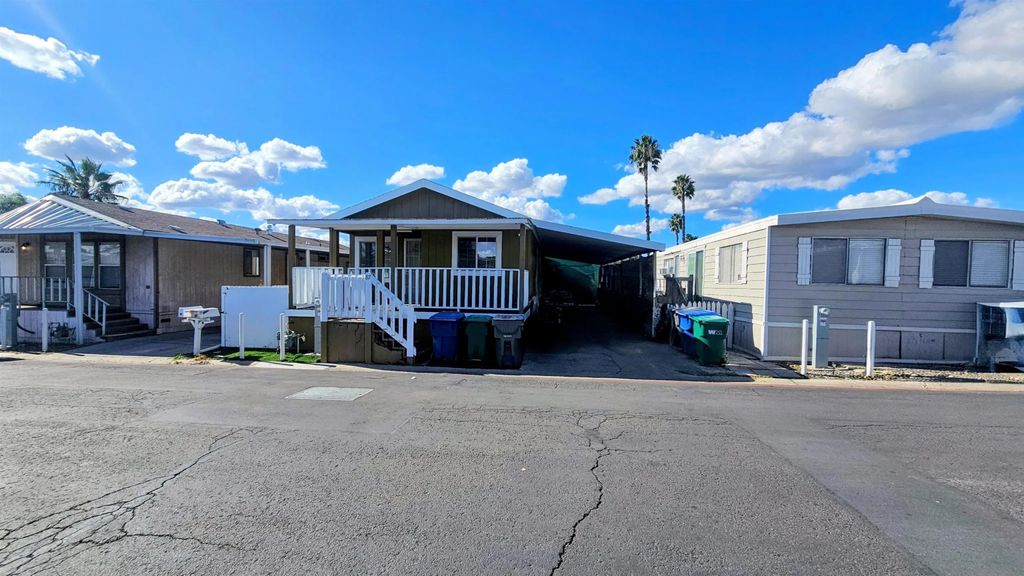 Photo of 400 Greenfield Dr #SPC 87, El Cajon, CA 92021 (MLS # 250045242)